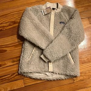 Patagonia. Girls. Size 12. New with tags. Very cute jacket.